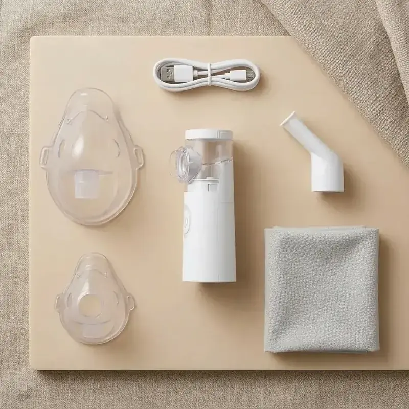 Flat-lay knolling photograph of the complete Nebu Ease kit contents